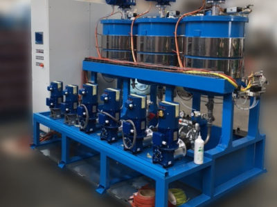 Sistemas de producción paneles sandwich - Adecuación de máquinas - Sección lana mineral máquina dosificadora de adhesivo